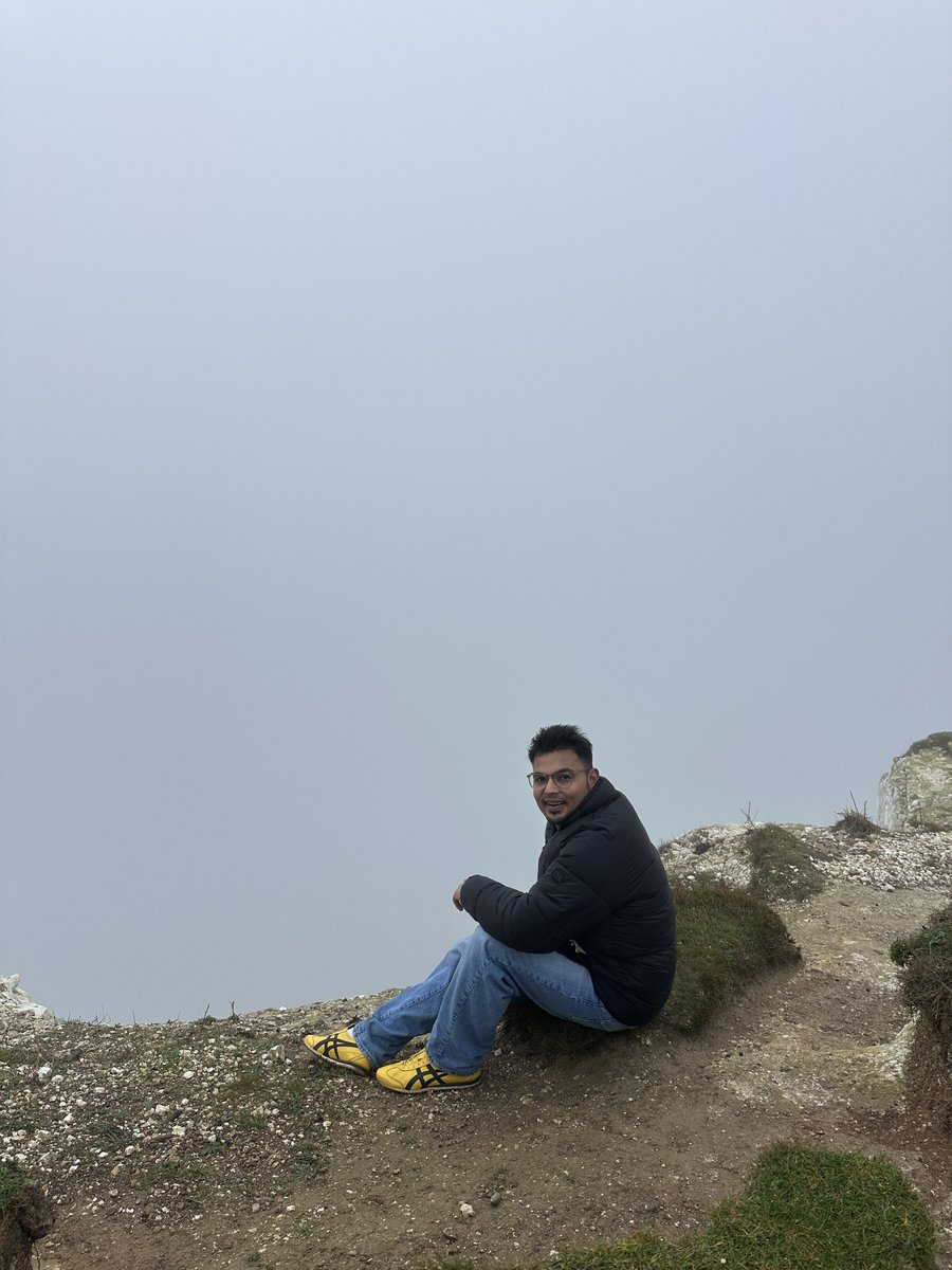 White cliffs of Dover, with the sea fully drowned in the fog.