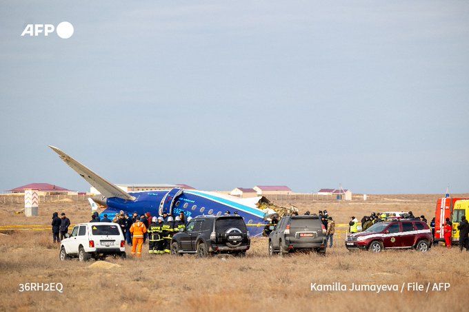 File photo shows emergency specialists working at the crash site of an Azerbaijan Airlines passenger jet near the western Kazakh city of Aktau on December 25, 2024