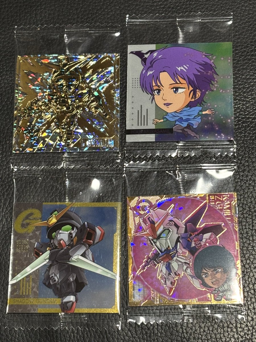 一緒に買ったガンダムシールウエハース2弾もなかなかの引き。
シークレット3種のうちの1枚が出たけど、ダブルオーのオーガンダムでした。
ありがとうございます。 