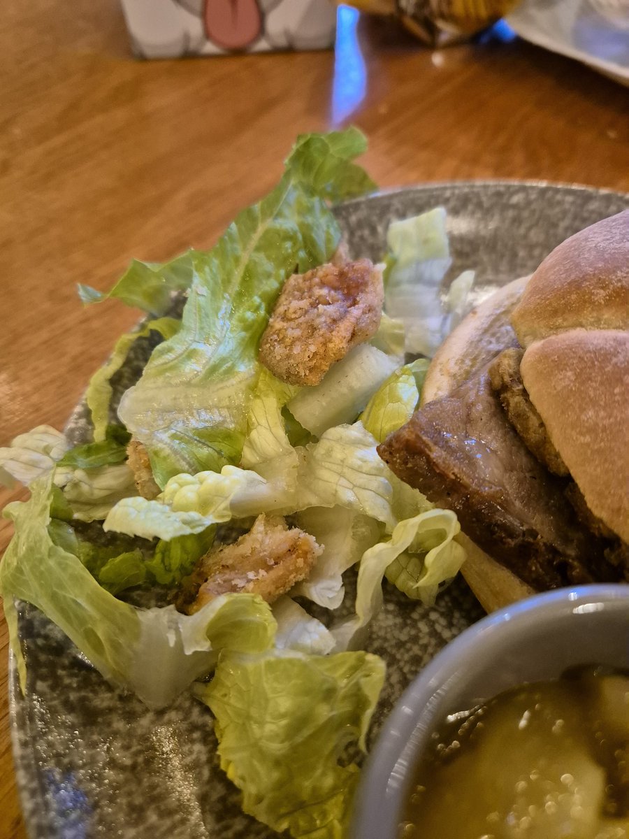 I'm not one for photographing my food but today my side salad came garnished with pork scratchings!