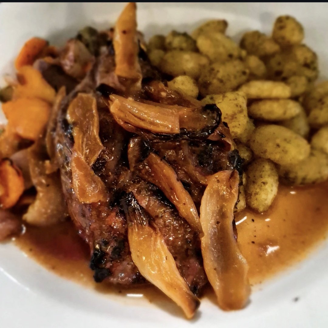 Marinated Bavette Steak Grilled Med Rare, Garlic and Spinach Gnocchi, Roasted Vegetable and Caramelized Onion Jus