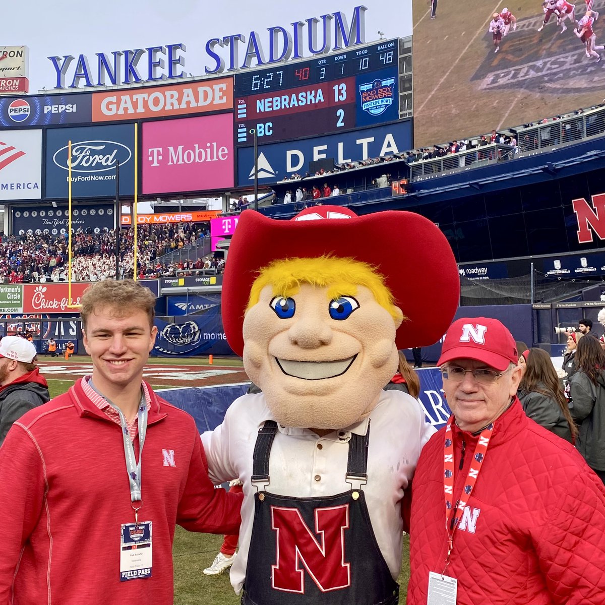 On the field at Yankee Stadium 3rd quarter with Herbie Husker and <a href="/UNKearney/">University of Nebraska at Kearney</a> student regent <a href="/SamSchroeder52/">Sam Schroeder</a>. 20-2 at this time. Hold strong, Huskers! <a href="/HuskerFootball/">Nebraska Football</a> <a href="/Yankees/">New York Yankees</a> <a href="/PinstripeBowl/">Bad Boy Mowers Pinstripe Bowl</a> #GBR