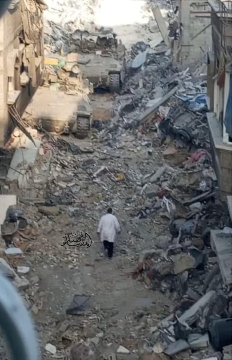 I spent a lot staring at the photo. A doctor facing Israeli tanks and walking towards them unarmed. 

This bravery is bigger than the whole world's spine. 

Demand justice and freedom for Dr Hussam Abu-Safyya. He is the world's hero.