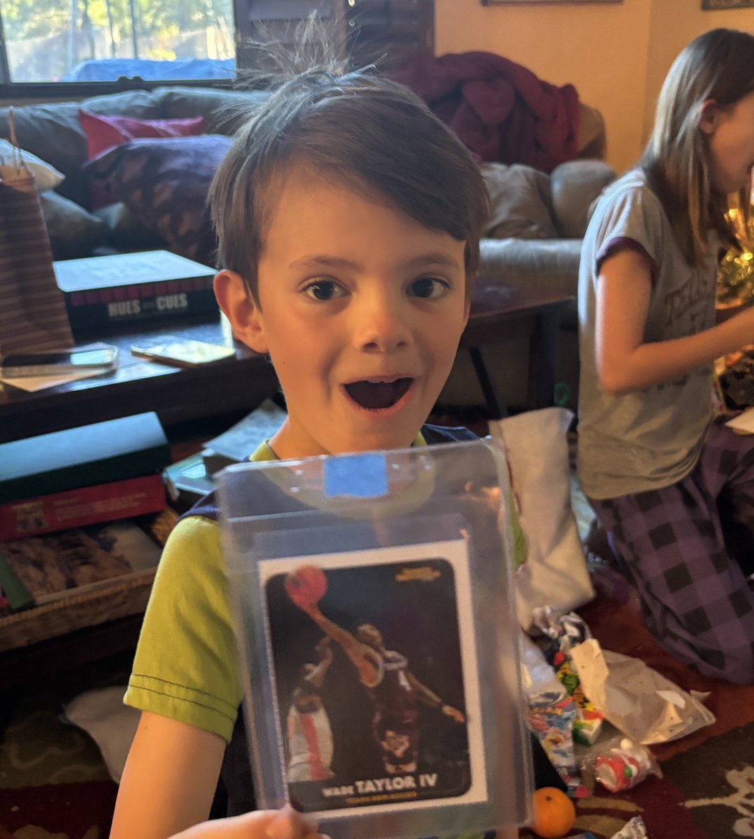 ehajovsky's tweet photo. What a day for Wade Taylor! Here’s his #1 fan with his favorite Christmas gift! 🎄🏀@aggiembk https://t.co/Kmu87pYsac
