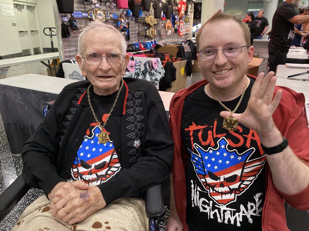 SoonerBookworm's tweet photo. 92 year old grandpa’s first WWE show!! 
#WWEOrlando https://t.co/IMIwYCUIez