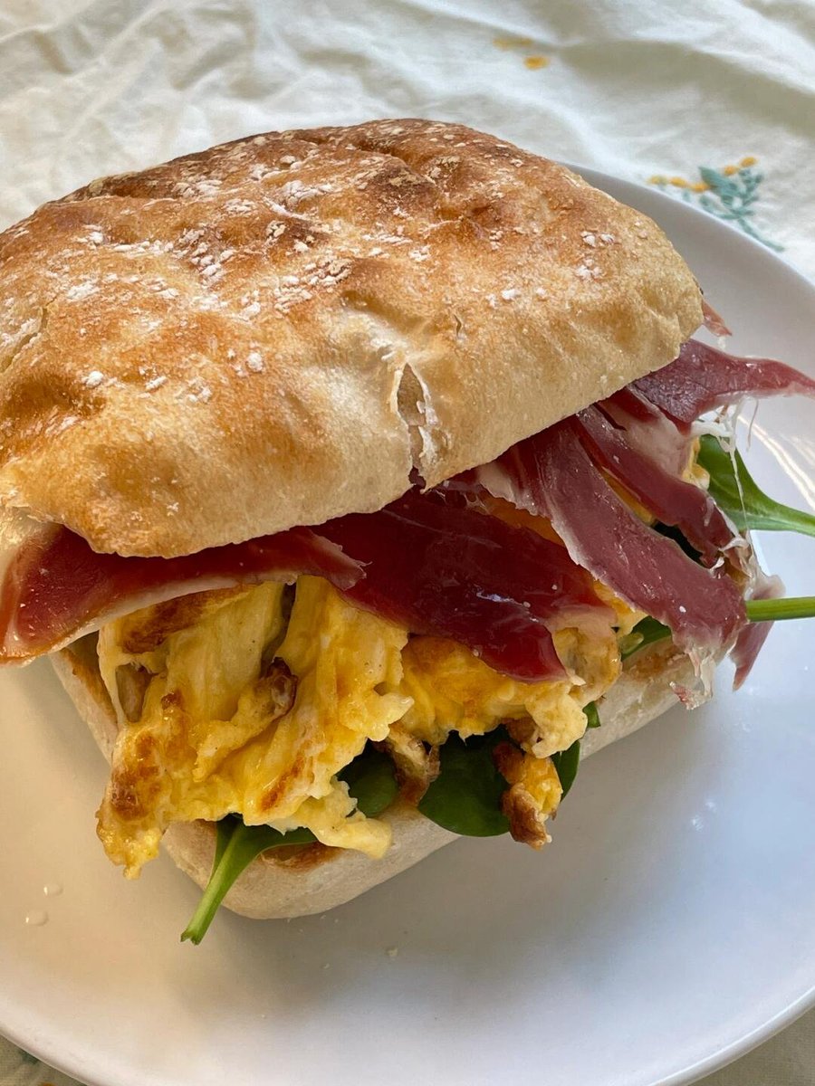 Dogwood3122's tweet photo. 🥩Today's breakfast: a stack of arugula, fried egg, and Iberian ham. The bread is spread with fresh cheese. The ciabatta looks a bit dry, but it’s actually really soft when you bite into it. A great start to the day!😋#Ham #GoodMorning #Weekend #Cleveland #FoodLover #HamLover https://t.co/8tKX9F7xSe