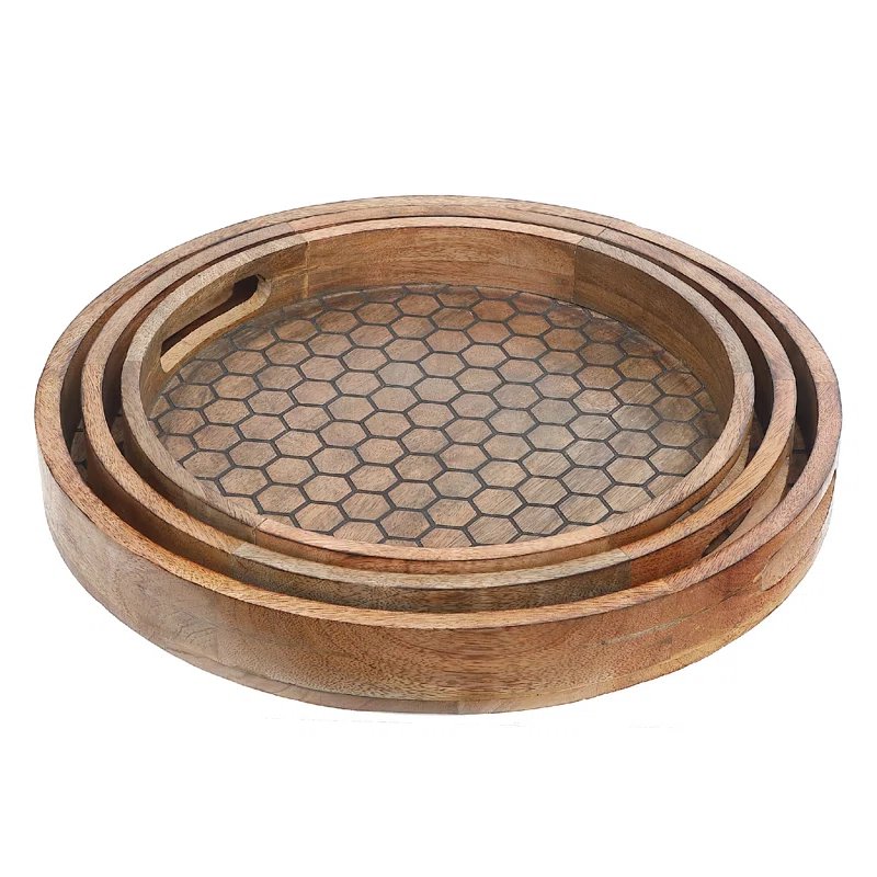 qualitycrafts0's tweet photo. A set of three Mango Wood Honeycomb Round Tray comes with handles on the sides. There is a textured design on the top that accentuates the look. Available in round shape, it complements all kinds of dining room accessories. #Decoration #homedecorideas #KitchenEssentials https://t.co/khweSbjtsa