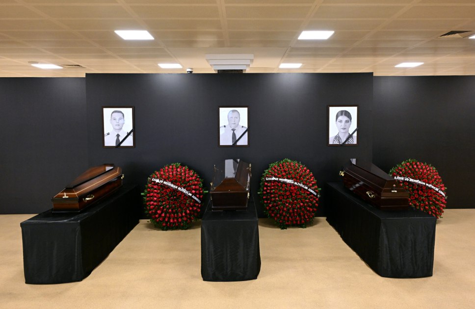 KonulikShahin's tweet photo. A farewell ceremony is being held at Heydar Aliyev International Airport for the crew members who lost their lives in AZAL's Baku-Grozny plane crash.

Their family members and officials  are participating in the farewell ceremony.
RIP heroes 🙏 

#AzerbaijanAirlines #Azerbaijan https://t.co/Uyi2vlhk4R