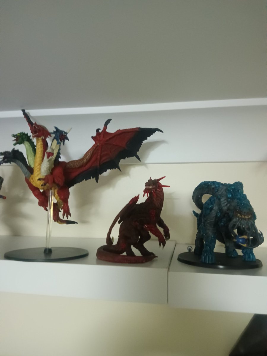 New shelf up. Best place to put my gem dragons, right next to Tiamat. <a href="/mattcolville/">Matt Colville?</a>