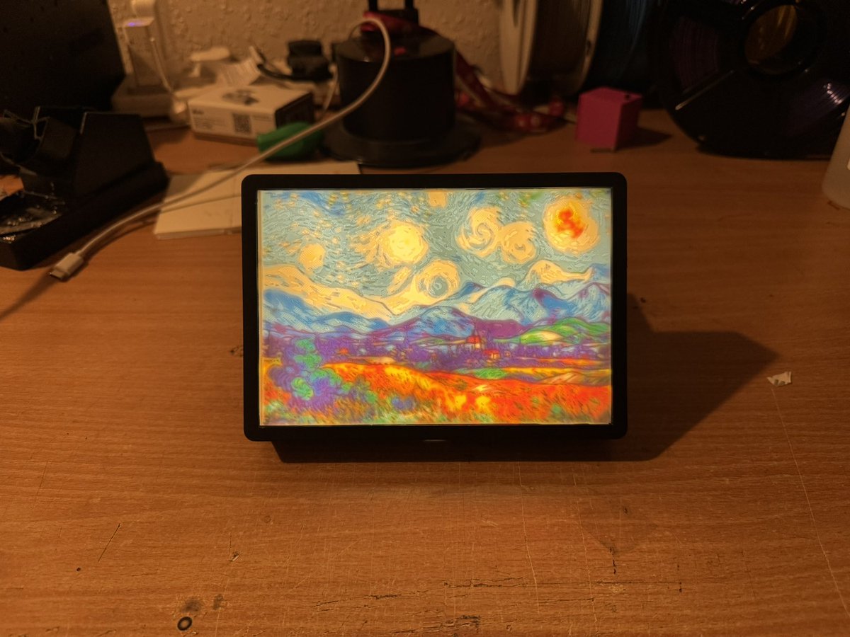 Saw this done a few months ago and was completely wowed, was a significant factor in investing in a new 3D printer! This is a CMYK lithophane, printed with 4 filaments.. which then does this when lit from behind. 🤩 <a href="/BambulabGlobal/">Bambu Lab</a>