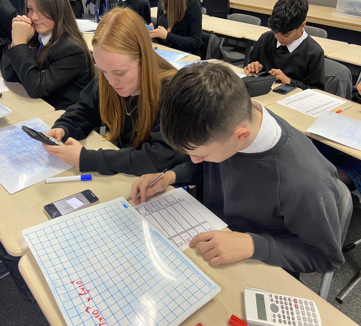 EhsMathematics's tweet photo. Some of our S2’s doing Scientific Notation calculations today in class in a paired maths activity. They demonstrated excellent team work✖️➗➕➖🧮✏️ https://t.co/EZrx3iJSeH
