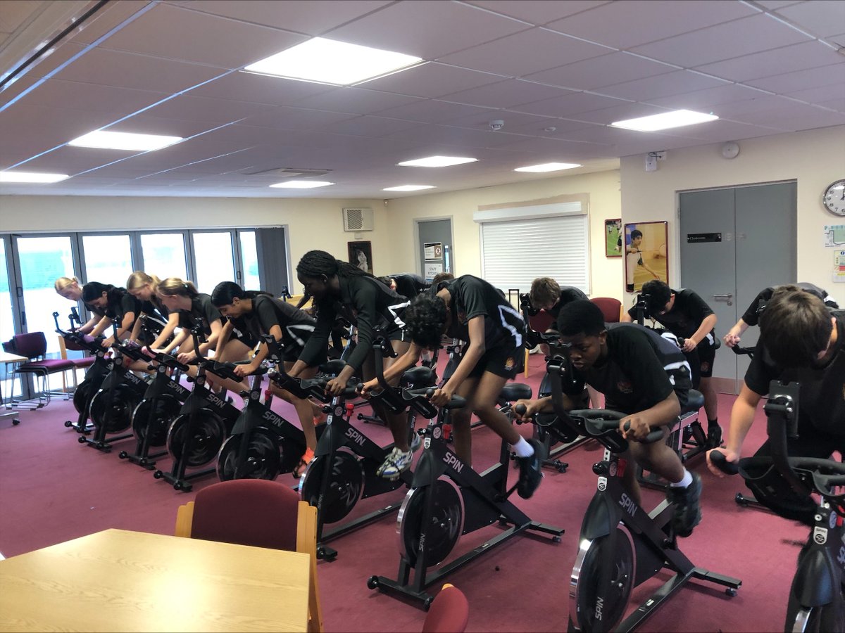 KEFW_School's tweet photo. Some fantastic determination and resilience shown by our Year 9 students in their PE lesson! 🚴‍♀️💪 Plenty of red faces as they experienced the short-term effects of exercise on the spin bikes. Great effort all round! 👏 #PEinAction #Resilience https://t.co/dTry49CRtV