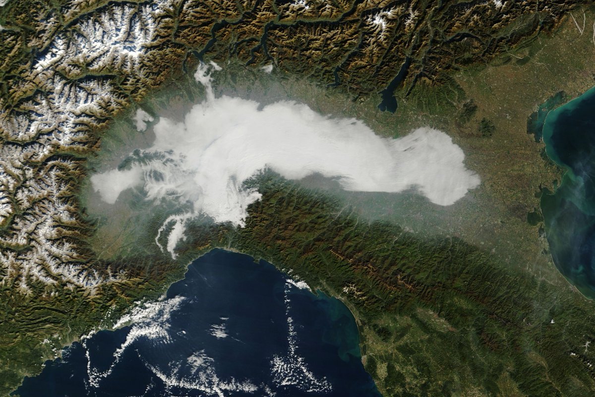 NASAGoddard's tweet photo. A hazy shade of winter in the Po River Valley 🌫️

@NASA's Terra satellite captured this image of fog in the morning of Nov. 16, which often occurs in the fall and winter under clear skies in the region. 
https://t.co/TimCOAFLo8 https://t.co/rvDYwbpjXB