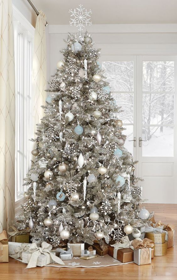 phan_versace's tweet photo. Shiny #silverfrost ornaments decorate the Christmas tree with tinsel. Matching the entire shiny silver aesthetic. #15WordPoet https://t.co/zgRMBalF1d