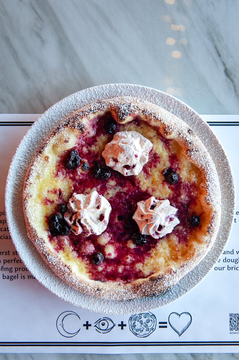 Folks — the most delicious dessert pizza we've tasted, cooked up in our wood-fire oven! The "Lemon Blueberry Meringue" is made on our pizza dough, with lemon curd, blueberry compote, meringues + powdered sugar. Personal pizza size. See y'all starting Thursday 🤤