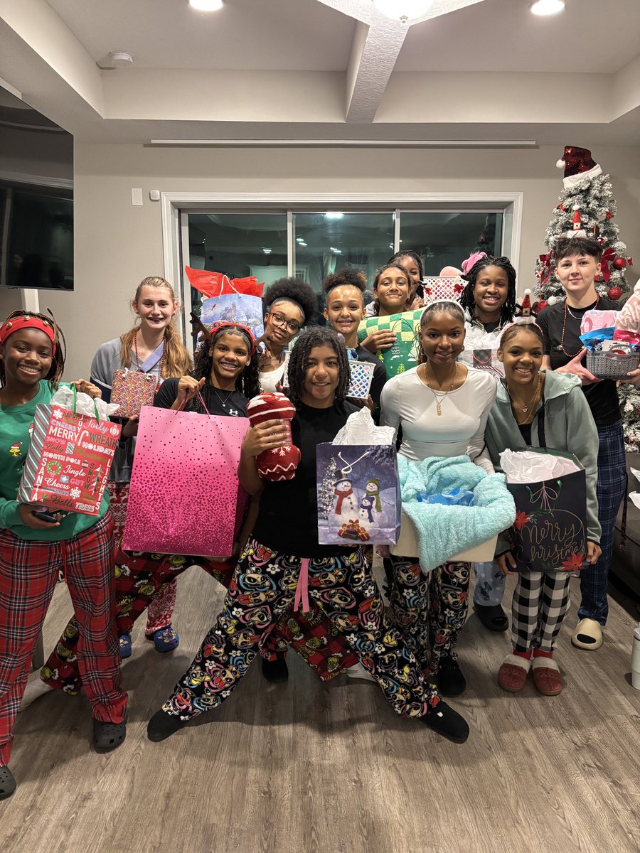 The girls enjoyed their secret Santa and team bonding. #morethanbasketball