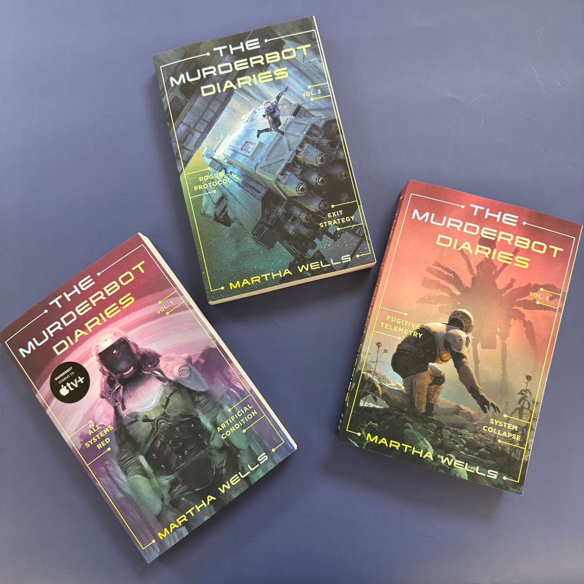 TorDotComPub's tweet photo. The happiest of book birthdays to the Murderbot Diaries omnibuses! 

Across three volumes, all of the novellas in the Murderbot Diaries series by Martha Wells have been collected in paperback for the first time🤖 https://t.co/FhT4RRyWqA
