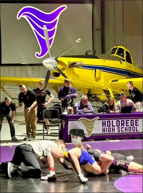 AgAviationNAAA's tweet photo. Nebraskaland Aviation owners Tye and Aimee Marquardt, NAAA operator members, hosted Nebraska’s first-ever wrestling dual in their ag aircraft hangar in Holdrege, NE. The event was a success for the community and great industry awareness and marketing by the Marquardts. https://t.co/lPWr2g9cSb