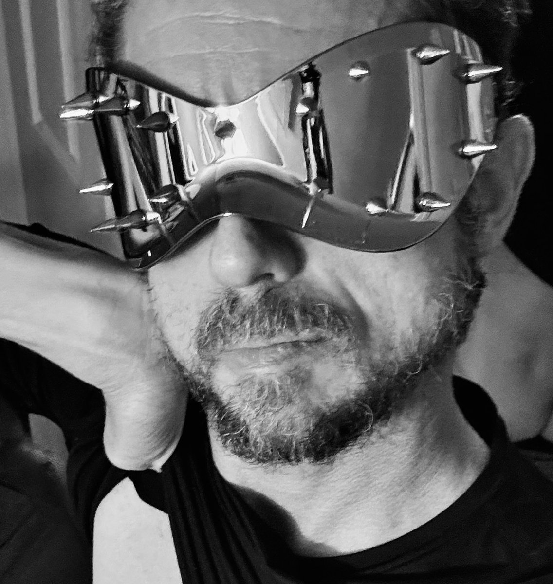 Maskterverse's tweet photo. What look should I attempt with these sunglasses: 

Something that looks:
1)Leather
2)Latex
3)Metallic
4)Neon

With a vibe like:
1) Dystopian Future
2) Rock-n-Roll
3) Freedom
4) Outerspace
5) Bonds https://t.co/HjEqtaVQbD