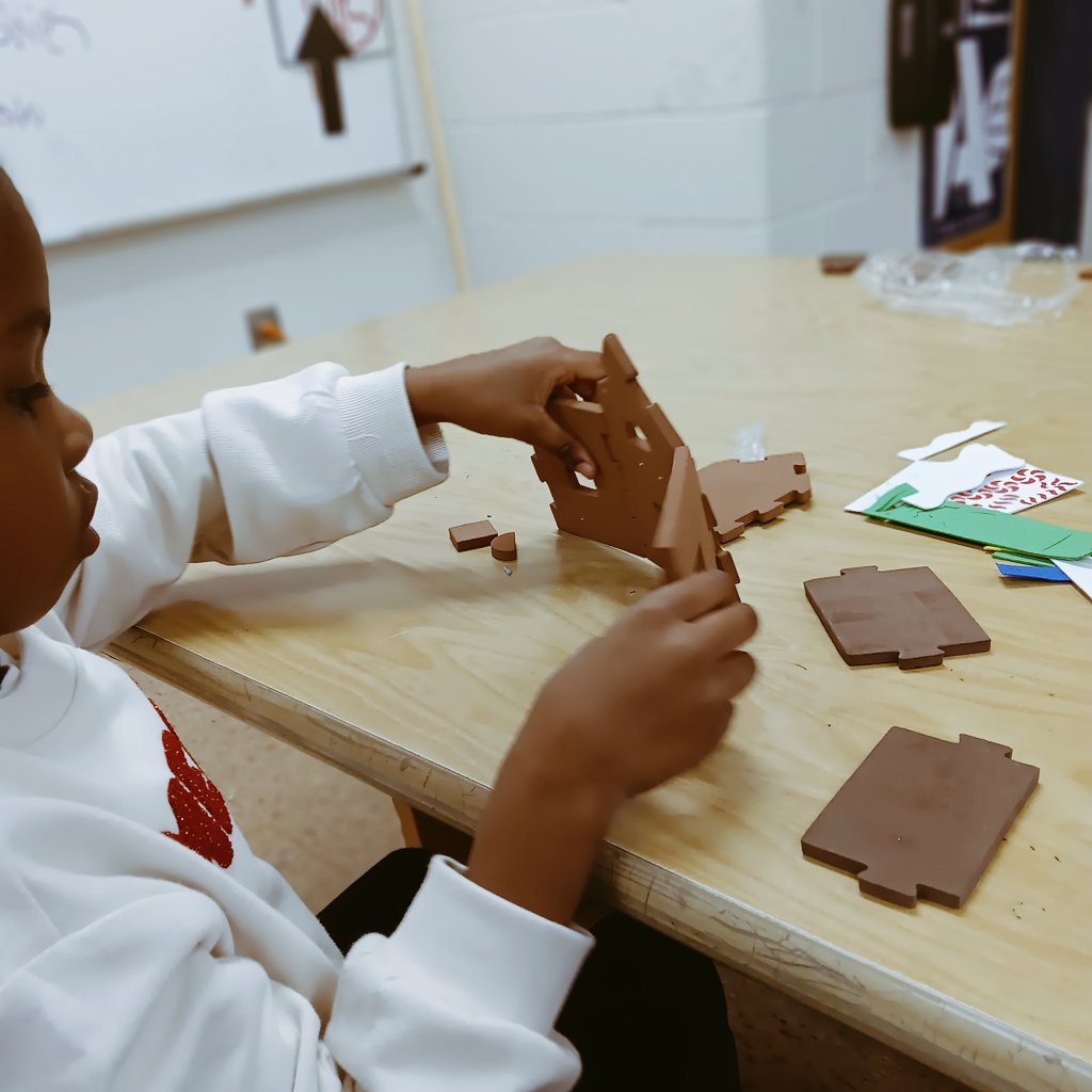 Using their problem solving and construction skills, kindergarten students built their Gingerbread house!