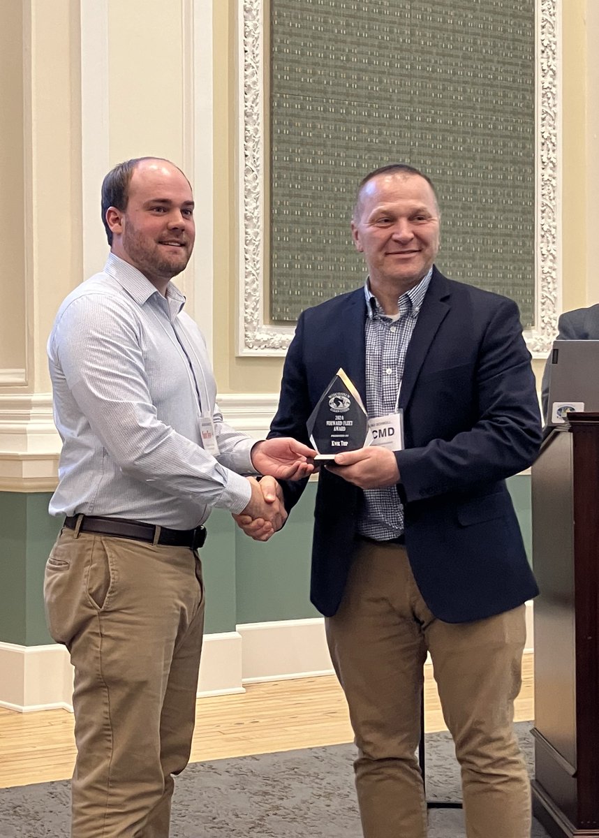 Brad Schmoll, Board Chair of WCC and Business Development Manager of <a href="/CMDCorporation/">CMD Alternative Energy Solutions</a>  presented Adam Schwartz, Electric Vehicle Charging Program Manager of <a href="/KwikTrip/">Kwik Trip</a> with the 2024 Forward Fleet award for saving Wisconsin from nearly 5 million pounds of CO2 pollution!