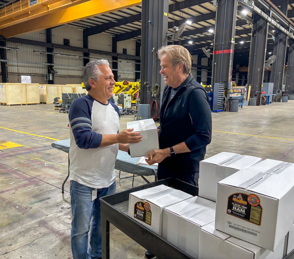 Paslin6's tweet image. Ham distribution day at Paslin is an annual Holiday tradition at Paslin. Another way to show Paslin’s profound appreciation to our employees who work so diligently to design and assemble our high-tech innovative systems. #CustomAutomation #happyholidays