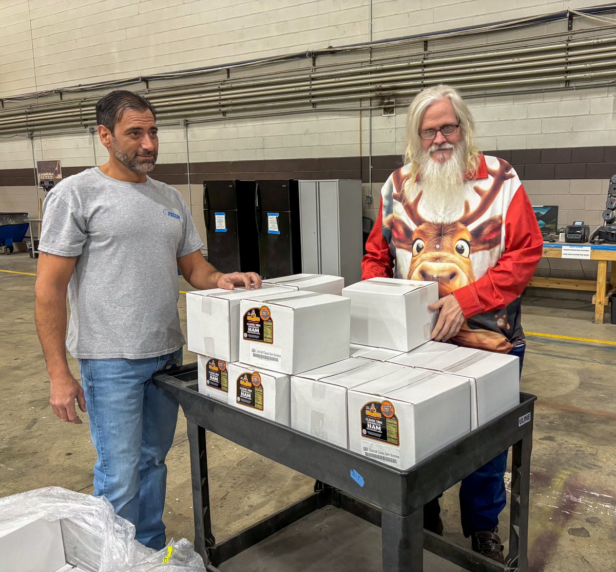 Paslin6's tweet image. Ham distribution day at Paslin is an annual Holiday tradition at Paslin. Another way to show Paslin’s profound appreciation to our employees who work so diligently to design and assemble our high-tech innovative systems. #CustomAutomation #happyholidays