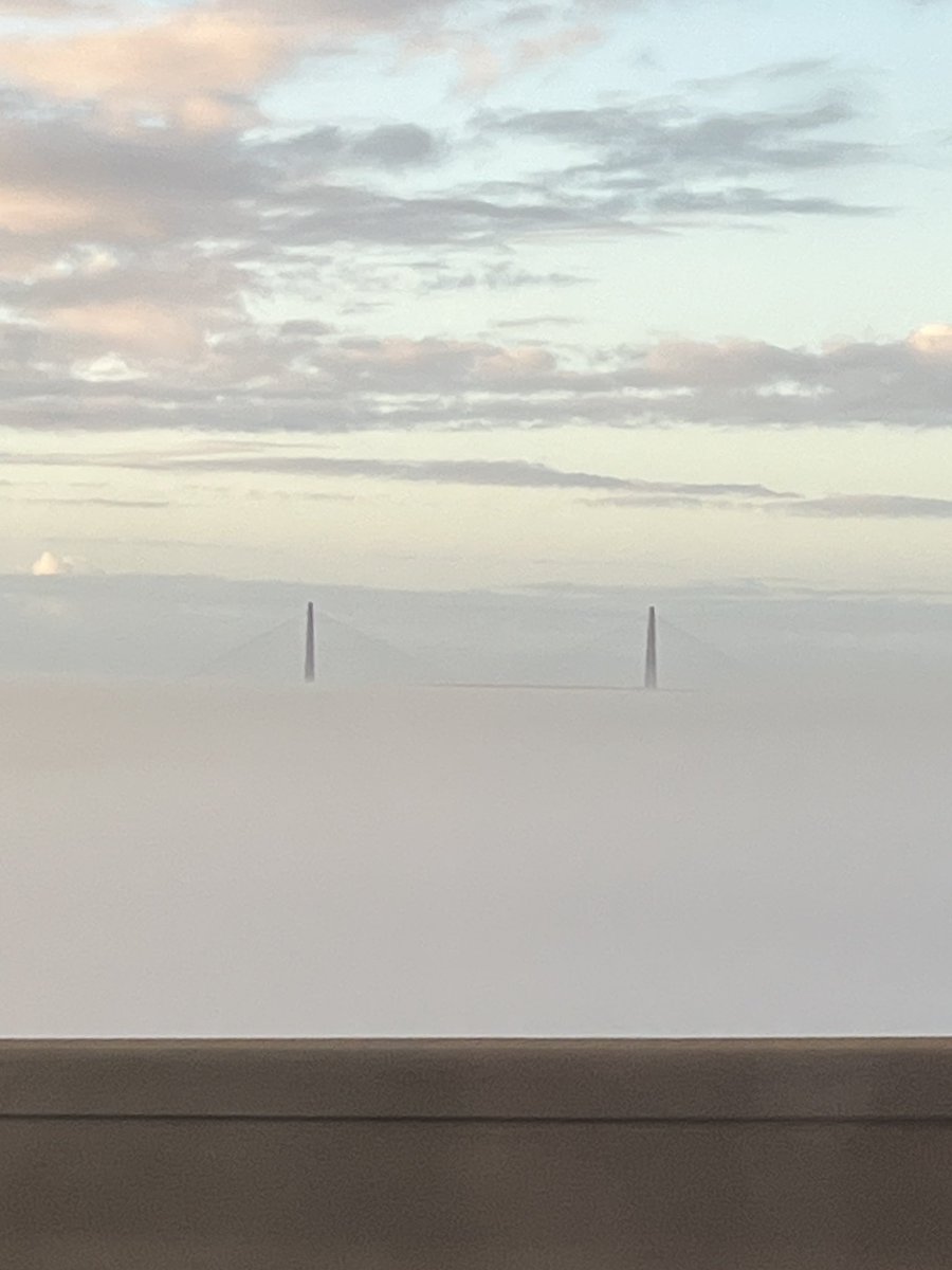 View of Ravenel over morning fog on the Wando River from the Wando Bridge. #SCwx #CHSwx
