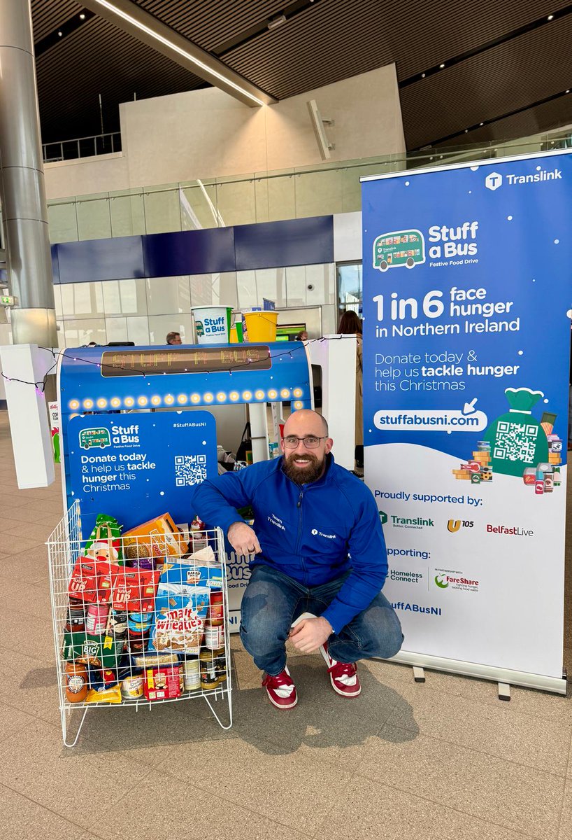Translink_NI's tweet photo. We are here all day at Belfast Grand Central Station. Why not come down and help us tackle hunger this Christmas? Your donations will be going straight to @FareShareNI  who will distribute to those most in need. #StuffaBusNI @U105radio @BelfastLive https://t.co/qSFDtws2Cr https://t.co/aArt8fAgci