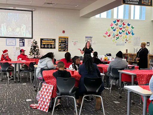 Chelsea Benson, Family Engagement Liaison, and Raquel Moss, College &amp; Career Readiness Coach, hosted "Pastries with Parents" to share volunteer updates, college/career readiness info, and resources for math and vocabulary, all while enjoying pastries and conversation.