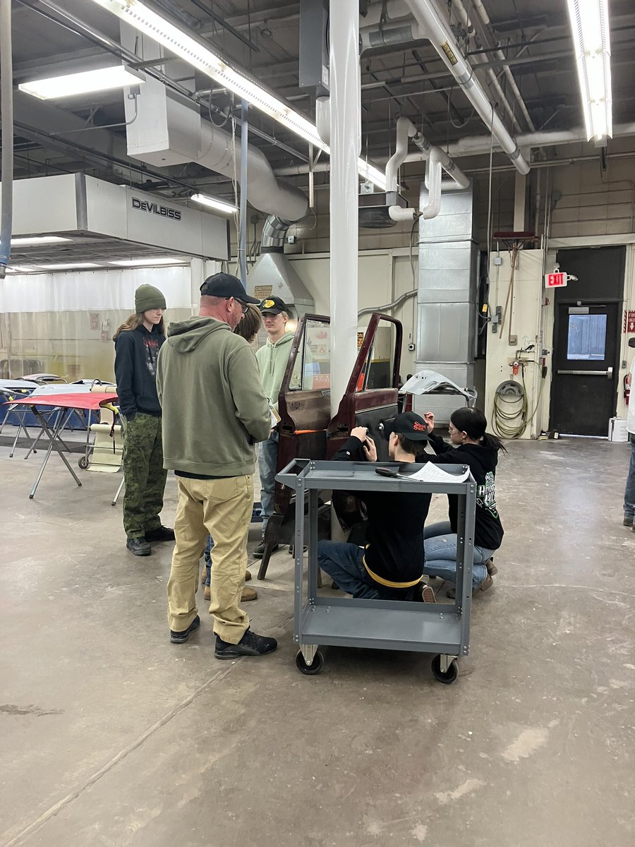 Auto Body students working on glass removal and installation 🚗 🔨