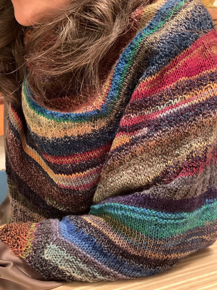 Daughter Maija with the shawl that I knit for her: an improvisation of short rows with many different leftover yarns.

#ilgadesigning #shortrows #shortrowknitting #shawlknitting #leftoveryarn #scrapyarn