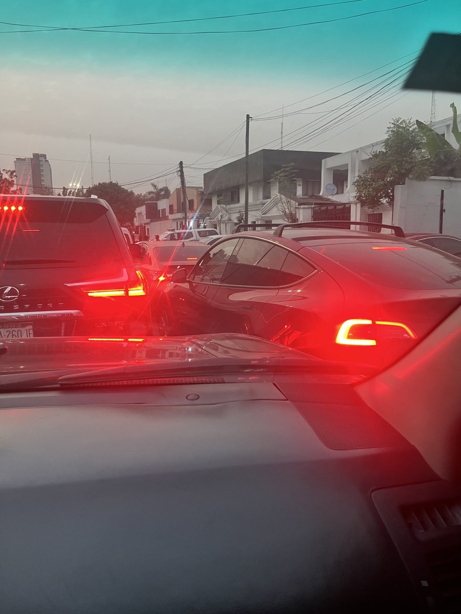 oomoniyi's tweet photo. A Tesla Model Y in Lagos…. what are the odds https://t.co/nSYxx6Ra46