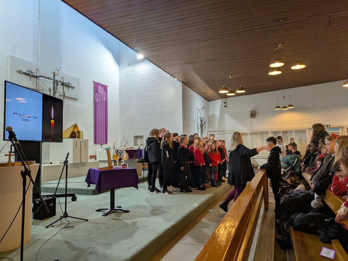 StPaulsRCPS's tweet photo. The whole school walked along to St Paul’s church this morning and had Christmas Mass with Fr Kerr and shared some Christmas Carols. It was delightful to share our Christmas joy with others in our church community! 🖤♥️ https://t.co/anK4LnoszU