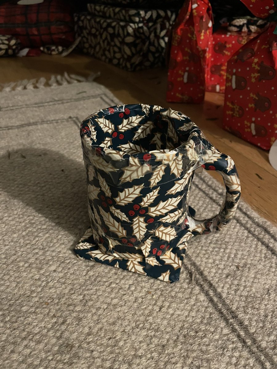 lankathon's tweet photo. just spent the last hour wrapping these two presents am i cooked https://t.co/n7F3qjJzPV