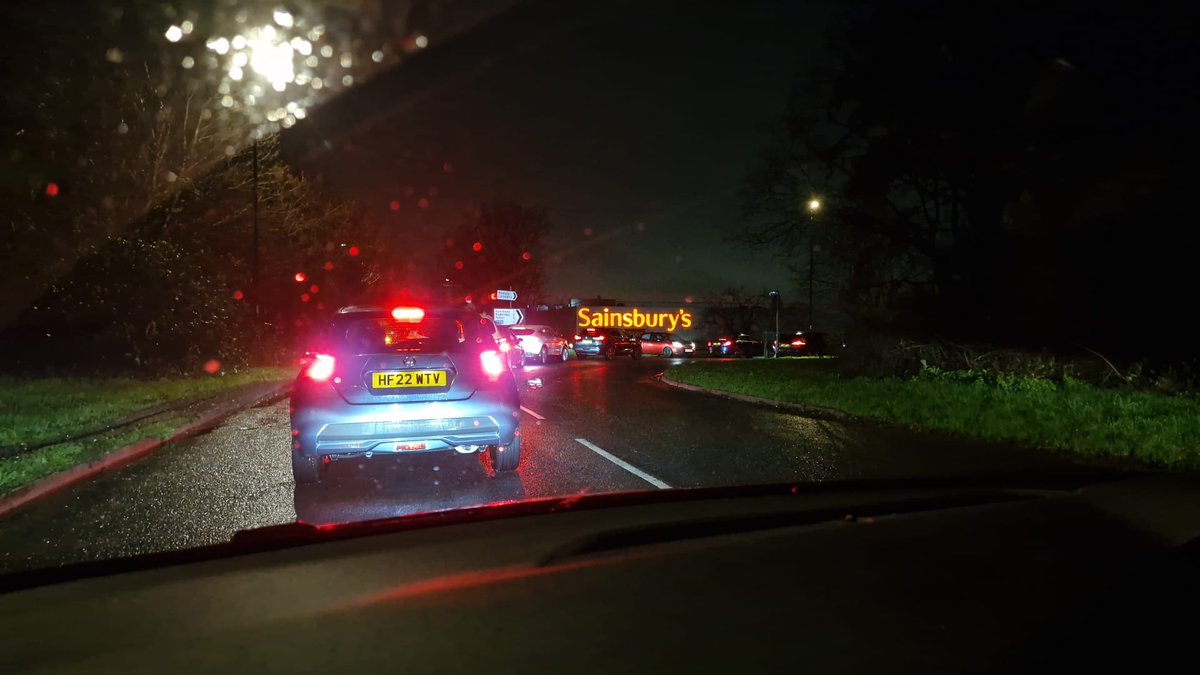 DeanAddison's tweet photo. @SouthernWater What a joke, even at 9:30pm its gridlocked around the Sainsbury at Lordshill as people desperate for a basic human right try to get some water. Shame on you Southern Water - 3 points for 55 000 households. Your response is a sick joke. https://t.co/bxNfVerKMX