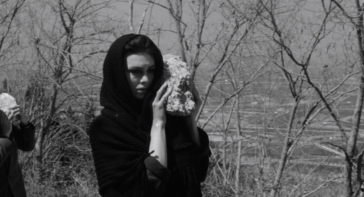 Italian folk horror film, The Demon (1963). Directed by Brunello Rondi and starring Daliah Lavi as Purificazione, a young woman suffering from an undiagnosed mental illness that's exacerbated by the outdated religious beliefs and superstitions of the town.