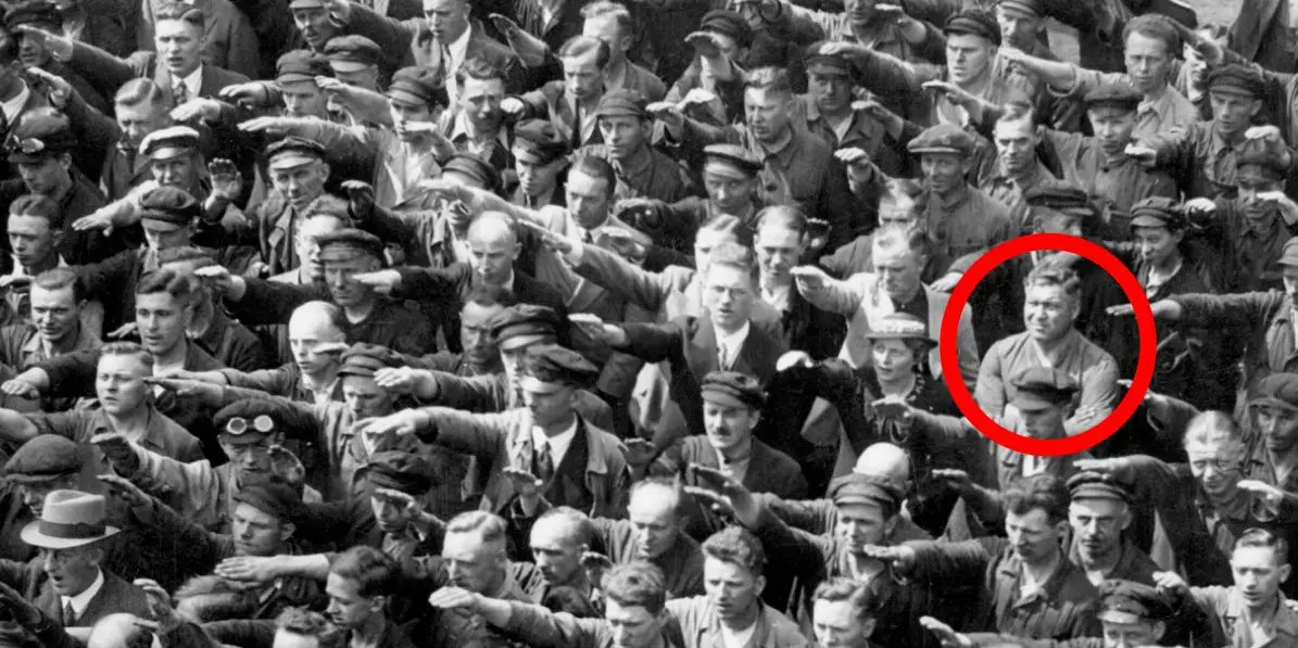 SpankyJBohanson's tweet photo. @ianmiles "Everybody else is doing it."  
"I'll lose my job."  
"I am just following orders."   
Be like August Landmesser. https://t.co/SixpjMHWHS