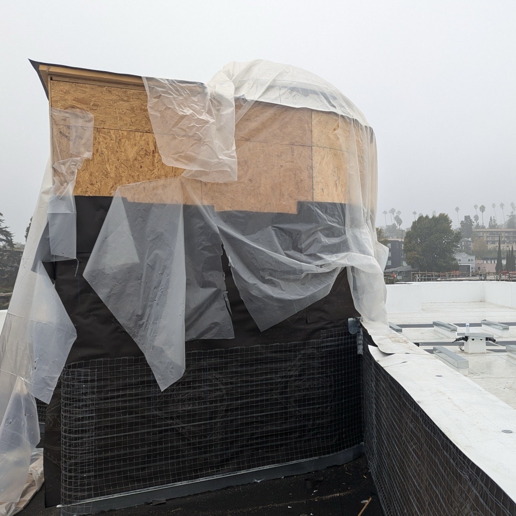 lahmonarch's tweet photo. Overcast skies at our Sunset project in Silverlake, but the stunning hillside views from the rooftop still shine through. Alpha Construction is framing one of the spiral staircases leading to the roof deck, beautifully illuminated by natural light even on this gloomy day. https://t.co/nGxw2TOnfn