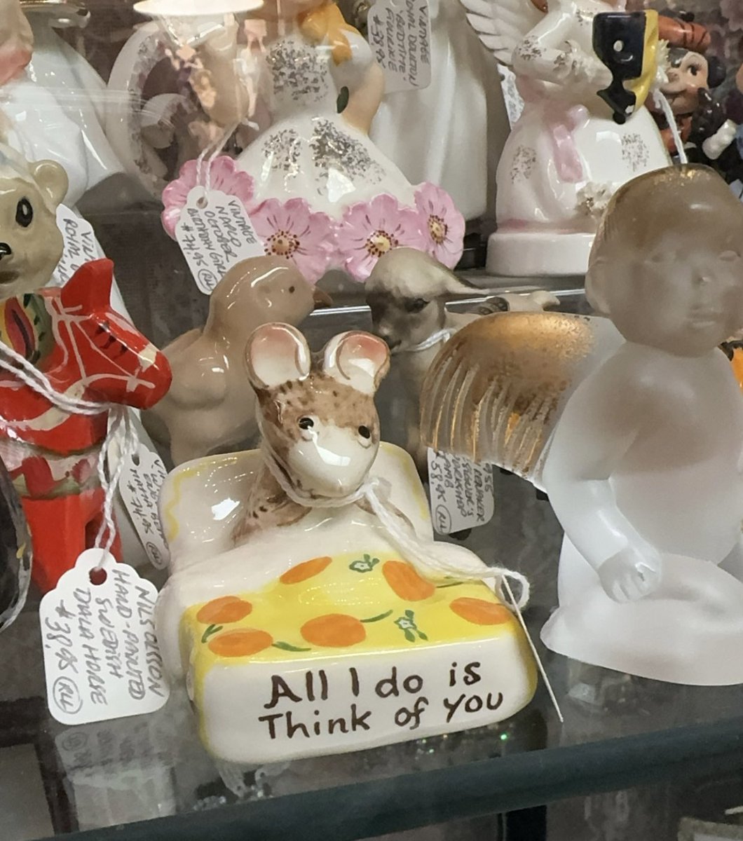 Today I am a ceramic mouse laying in my matchbox bed…..