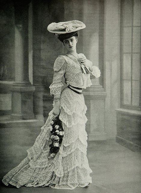 1905 Afternoon dress. Layers of beautiful lace. The beginning of the  Edwardian era in stye, but still leaning toward the Victorian era with the  high neckline. Lovely hat to match and bouquet