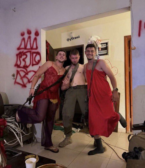 312shelly3's tweet photo. @ytirawi @CIJ_ICJ After #ISRAEL’S #IDF #rape, #torture, #plunder, #slaughter #IndigenousPalestinian #Women, they wear their #dead #rape #victims #lingerie & pose for photos in their homes these #IDF pissed up & graffitied as their #dead #rape #victims lay prone at their feet & out of shot https://t.co/nVj1NEngio