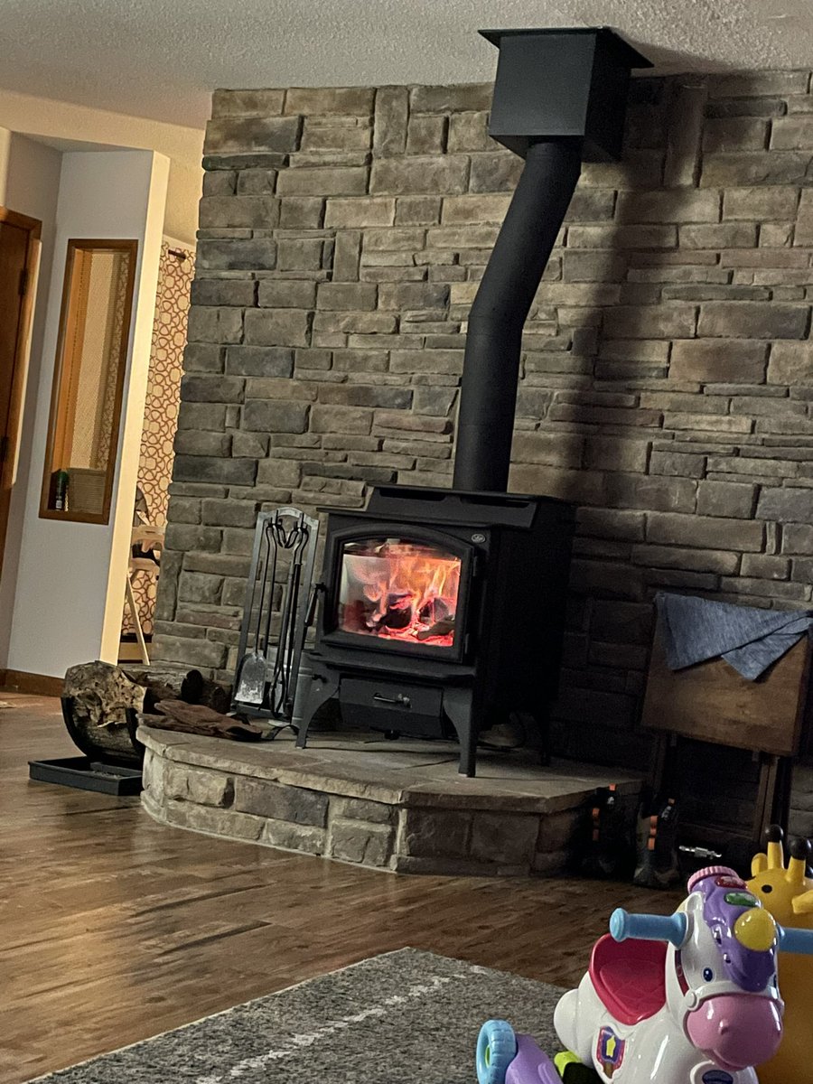 Mshmizzle's tweet photo. Not an old stove, but keeps this old house warm. The unicorn is a new installment 🙃 https://t.co/AO4e9vTXix
