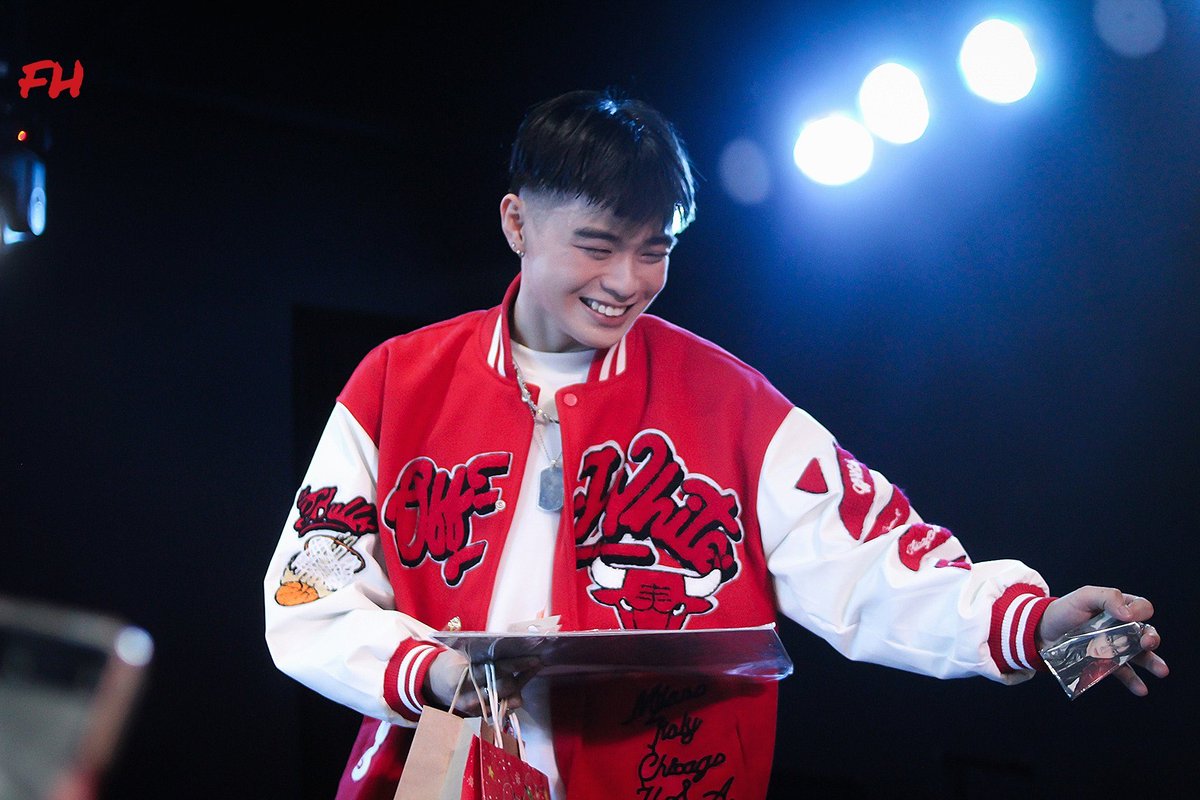 this photo of jc smiling ear-to-ear while holding a zb1 hanbin digipack pc. absolute perfection.