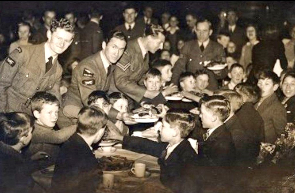 In the face of darkness, a little light 🕯

Two Polish airmen, exiles themselves, were struck by the plight of children whose homes had been destroyed in the Coventry Blitz.

They paid for a party for 200 children in Oxford Town Hall, and waited upon the children themselves.