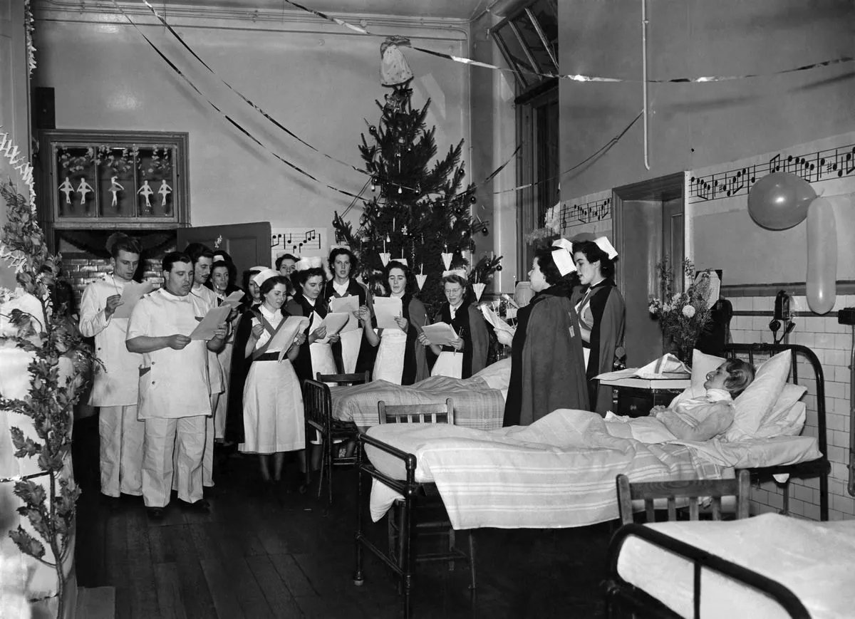 GroomB's tweet image. Carols at Salford Royal Hospital, Christmas Eve 1952 (Manchester Evening News).
