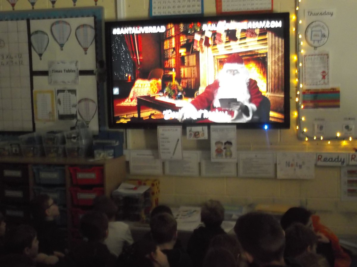 menstonprimary's tweet photo. Year 3 children have enjoyed a live with Santa this morning. Santa read 'T'was the Night Before Christmas' live from the North Pole and then we all sang some Christmas songs.
It has definitely got us into the Christmas mood! #Santaliveread https://t.co/pQqmJa9RdT