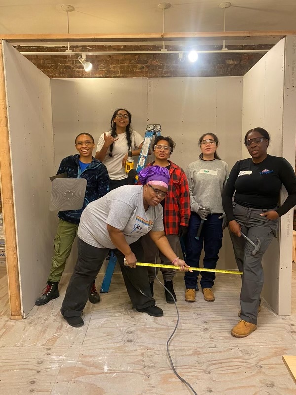 NEW graduate Yakara (pictured with tape measurer) just landed an apprenticeship with Union Local 157 Carpenters! 

Grateful for NEW’s support, she said, "NEW prepared me for everything. I found a network of people who wanted me to succeed. I found a family." 

#NEWstrongWomen