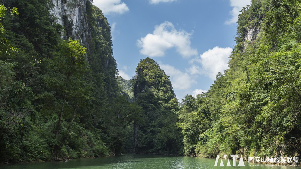 IMTAOFFICIAL's tweet photo. 🌄Explore #Getu River: A Thrilling Adventure with Miao Culture and Karst Wonders

The Getu River National Park is located in #Ziyun Miao and #Bouyei Autonomous County, #Anshun City, #Guizhou Province. It stretches for 128 kilometers with a drainage area of 2,441 square kilometers, making it a mountainous tourist destination that combines karst landforms, rich ethnic culture, and natural wonders. The karst landscape here is particularly unique, with the river winding through towering peaks on both sides, forming numerous geological wonders such as caves, sinkholes, and underground rivers, making it a world-class karst natural park.

The natural scenery of the Getu River is diverse and abundant, offering both modern international extreme sports such as skydiving, bungee jumping, and wingsuit flying, as well as traditional Miao ethnic activities like the "Spider Man" rock climbing and walking on knives and fire pits. These unique activities provide visitors with a variety of experiences, allowing them to enjoy the thrill of modern adventure while also immersing themselves in the charm of ethnic culture.

The Getu River not only boasts rich natural landscapes but also holds a deep cultural heritage and unique ethnic customs. The area is home to the Miao and other ethnic minorities, who have lived and worked here for generations, creating a vibrant and diverse cultural legacy. Unique Miao customs, such as the hanging coffin burial and the Spider Men who climb cliffs without any equipment, are integral parts of Miao culture. When you see the coffins suspended on the cliffs, you will be deeply moved by the courage and wisdom of the Miao people.

The Getu River experiences distinct seasons, with spring and summer being the best times to visit. In spring, the mountains are adorned with blooming flowers, while summer offers lush greenery and pleasant weather. During the autumn and winter months, the temperature is moderate, making it ideal for activities like mountain trekking, creek tracing, and cave exploration. Whether you're an adventure seeker craving extreme sports or a traveler interested in exploring nature and culture, the Getu River offers an unforgettable journey for all.

🖋Editor Ⅰ: Yuli
🖋Editor Ⅱ: Helen
🖋Editor Ⅲ: Liu Guosong

#IMTA #MountainTourism #GetuRiver #GuizhouAdventure #KarstLandscape #MiaoCulture #ExtremeSports #CulturalHeritage #NatureExploration #HangingCoffinBurial #SpiderManClimbing #BungeeJumping #GuizhouTravel