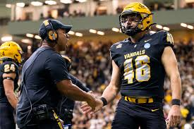 Tom Kendall (@tomkendall92) on Twitter photo Today is a great day to be a Vandal especially when you have the likes of <a href="/CoachTFord/">Thomas Ford Jr</a> and <a href="/hogan_hatten/">Hogan Hatten</a> supporting such a fine <a href="/VandalFootball/">Idaho Football</a> program.💛🏈 Today is a great day to be a Vandal especially when you have the likes of <a href="/CoachTFord/">Thomas Ford Jr</a> and <a href="/hogan_hatten/">Hogan Hatten</a> supporting such a fine <a href="/VandalFootball/">Idaho Football</a> program.💛🏈